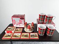Entire lot: four tartan mugs in boxes, cardinal tealight holder with its box, six hunting scene coasters and coaster box