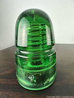 emerald green glass insulator front view