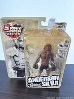 Front view of sealed Anderson Silva action figure in blister packaging