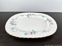Full view of white floral Aynsley oval platter