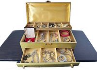 Overall view of Buxton jewelry box open with contents