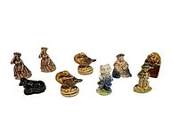 All nine Wade miniature figurines grouped together