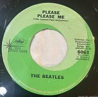 A-side label showing Please Please Me, green swirl Capitol Starline, catalog 6063