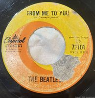 A-side label showing title, catalogue number and label tear