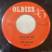 A-side label showing song title, artist, catalog number OL-151