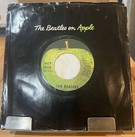 Front of sleeve with record showing A-side label