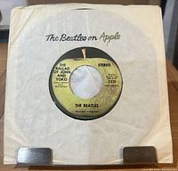 Record in company sleeve front view