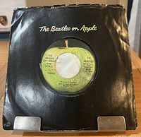 Record in black company sleeve front view