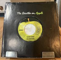 Front of sleeve showing center cut-out with A-side label visible