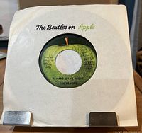 Record in white The Beatles on Apple sleeve front view