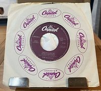 Front of company sleeve with record inside