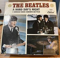 Front of picture sleeve showing title and photos