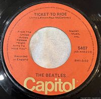 A-side label showing title, artist, catalogue number, orange Capitol label