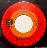 Label side A Help! red & orange target design