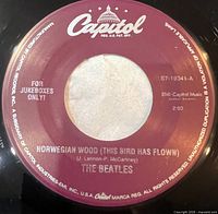 Side A label showing Norwegian Wood details