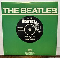 Front of green Parlophone picture sleeve showing collection branding