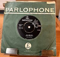 Record in green Parlophone sleeve front view