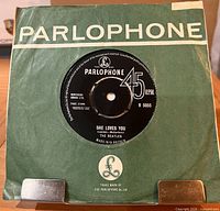 Front view showing green Parlophone sleeve and record A-side label