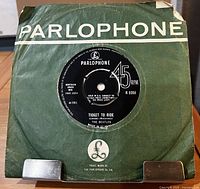 Front view showing green Parlophone sleeve and record center label