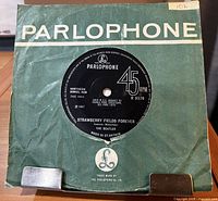 Front of green Parlophone sleeve with record inside