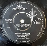 A-side label showing title, catalogue, tax code and rim text