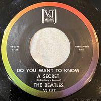 A-side label showing Vee-Jay rainbow brackets logo and track "Do You Want To Know A Secret"