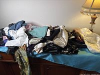 Overall view of mixed fabric remnants piled on a surface