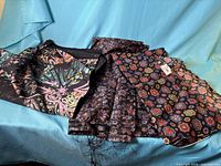 All three fabric pieces displayed together on blue background