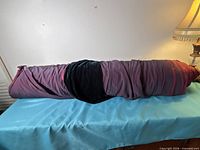 Full bolt of velvet fabric rolled on tube