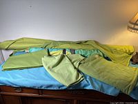 Overview of all green fabrics on table