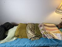 All six fabric pieces laid out side by side for overview