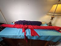 Both fabric bolts side by side on table