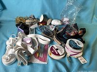 full lot overview showing ribbons, elastics, zippers, trims and small tool packet