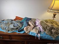 All fabric pieces laid out on dresser