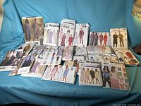 Group image of all pattern envelopes spread on sofa