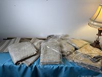 Group view of all folded fabrics on table