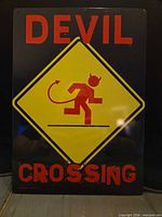 Front view showing design, colors, text and mounting holes