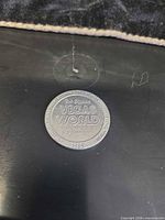 Obverse of 1985 Vegas World casino token showing text and date