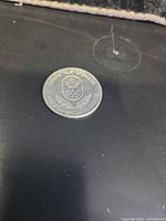 Obverse of coin with Canada Olympic Trust crest