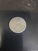 Obverse with Olympic Trust of Canada emblem and legend