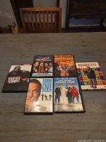 Front view of all six DVD cases spread on table