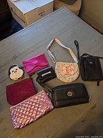 All eight small carry items arranged on table