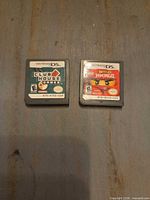 Front view of both Nintendo DS cartridges showing labels