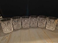 Front view of all six matching tumblers in a row