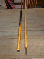 Both cue sections laid out showing full length and design