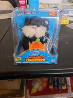 Front view of sealed Webkinz Mazin' Hamsters box showing hamster and accessory