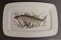 Top view of entire platter showing fish design and border