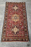 Full view of rectangular rug showing pattern and colors