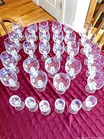 Top view of all 33 crystal glasses arranged on table