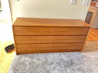 Front view of oak six-drawer dresser